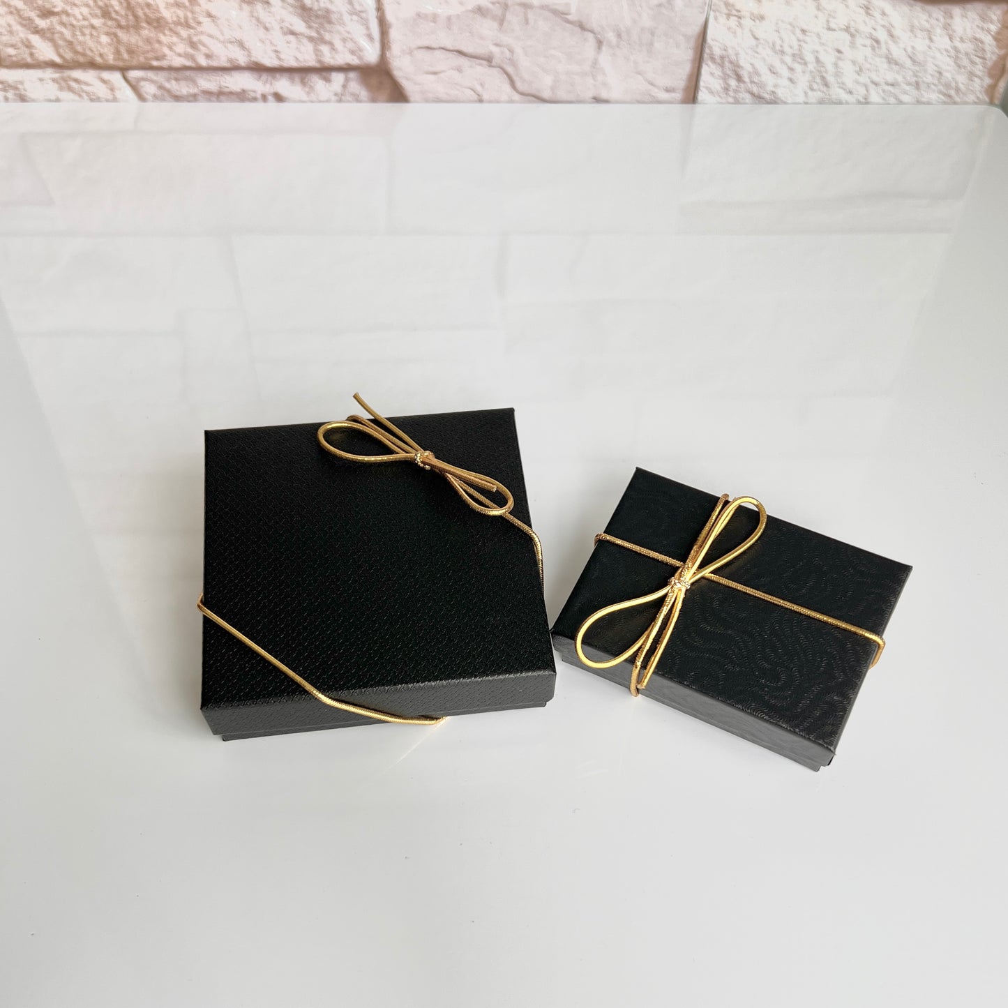 Textured Black Gift Box, Gold Cord Bow & Cotton Insert