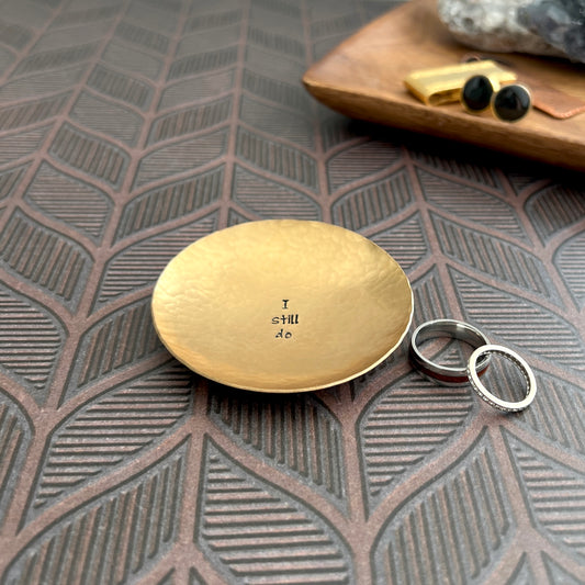 Hand-hammered round bronze ring dish with I still do hand-stamped in the center, handcrafted 8th anniversary gift by The Cutest Gifts