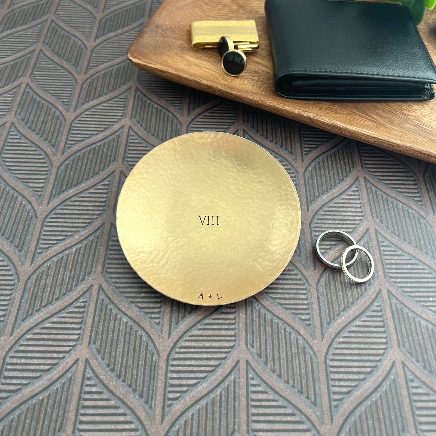 Personalized bronze ring dish with custom hand-stamped text, handcrafted and hammered in South Carolina