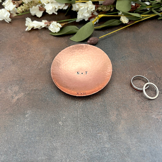 Personalized copper ring dish with custom hand-stamped text, handcrafted and hammered in South Carolina