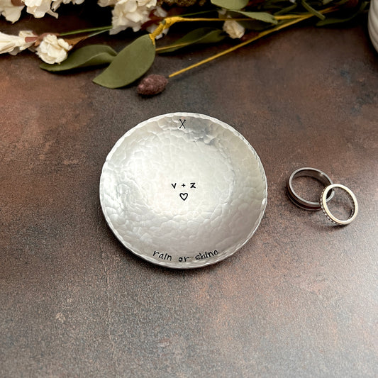 Personalized pewter ring dish with custom hand-stamped text, handcrafted and hammered in South Carolina