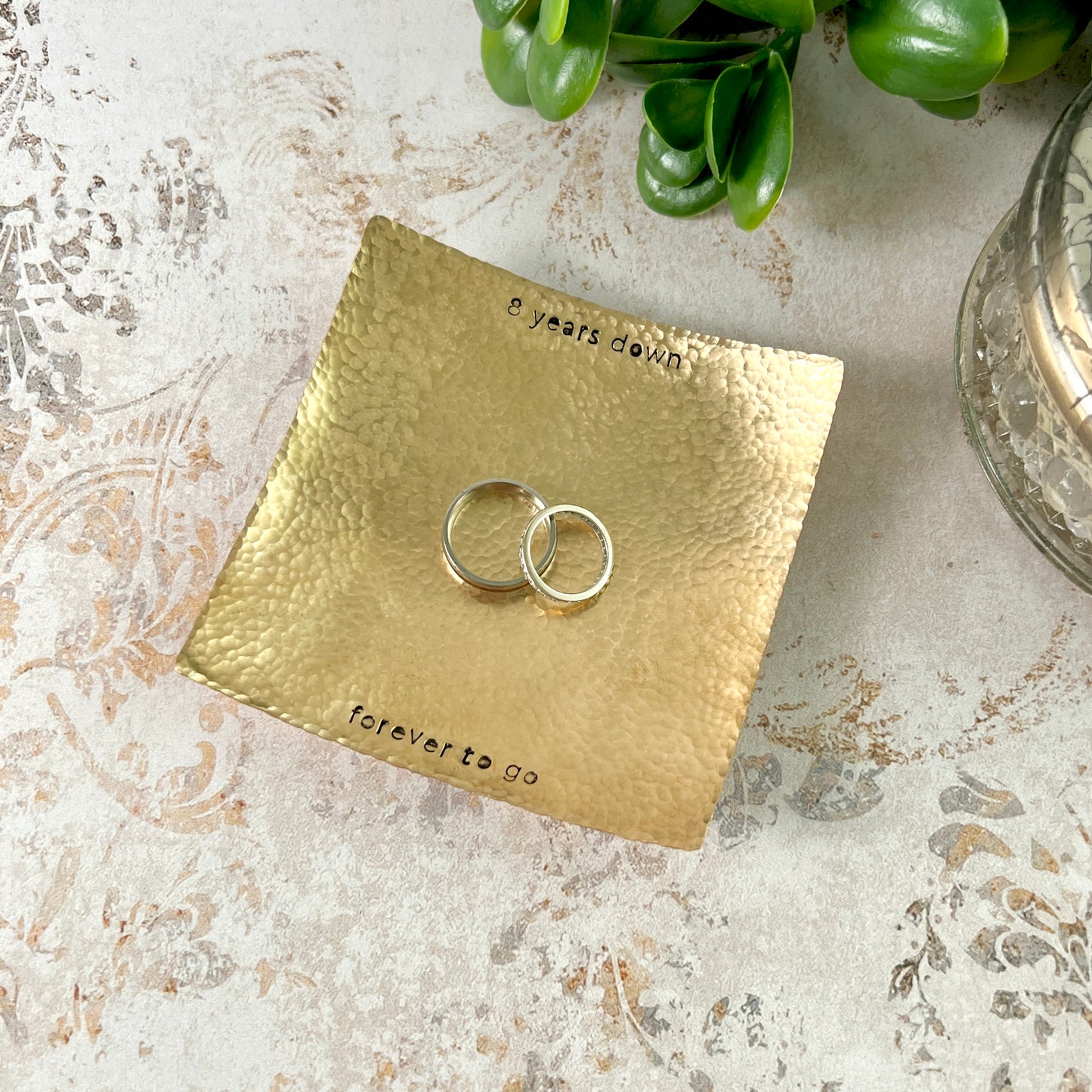 Personalized square bronze ring dish with custom hand-stamped text, handcrafted and hammered in South Carolina