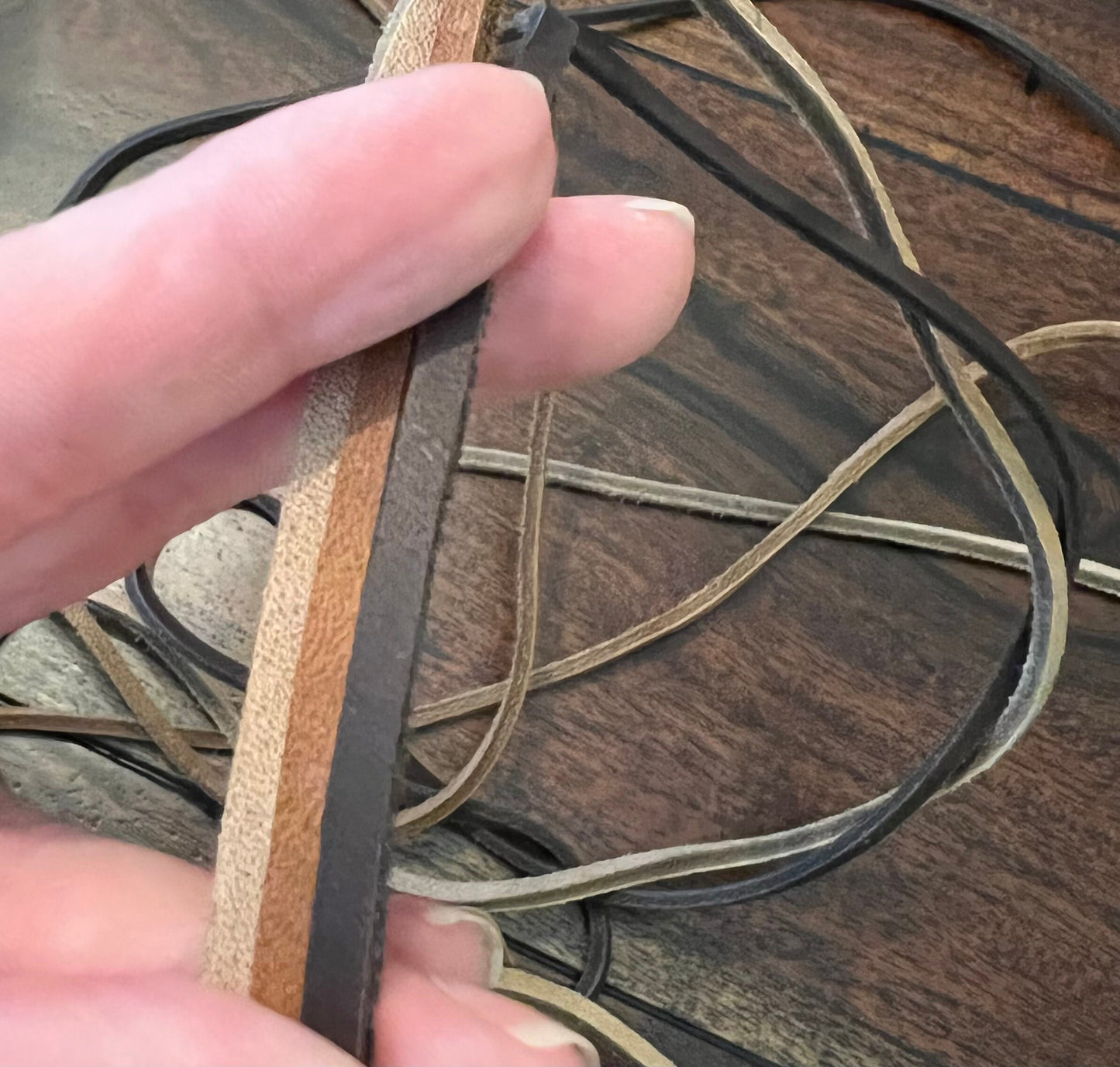 Genuine veg tan leather cord in pale brown, medium brown, and dark brown for jewelry and crafts